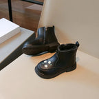 Black flower embroidered kids boots – lifestyle view