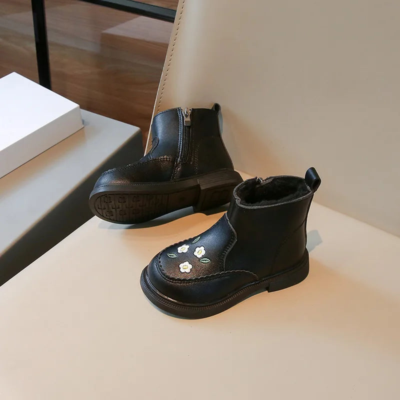 Black flower embroidered kids boots – lifestyle view