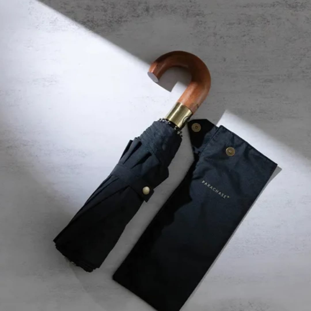 Black Parachase automatic umbrella folded with wooden handle