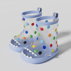Blue transparent shark rain boots for kids with colorful polka dots