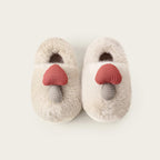 Cream mushroom bootie slippers for kids with pink mushroom detail