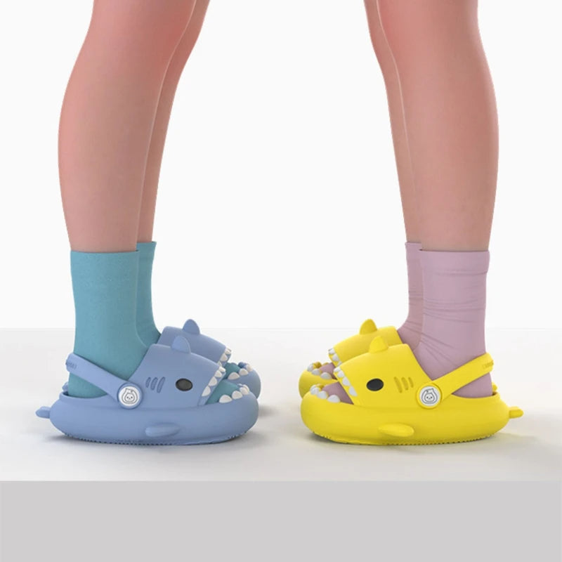 Kids wearing colorful 2-in-1 shark sandals with adjustable heel straps