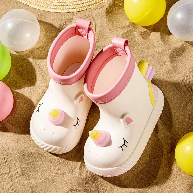 Pink unicorn rain boots for kids – waterproof outdoor lifestyle view