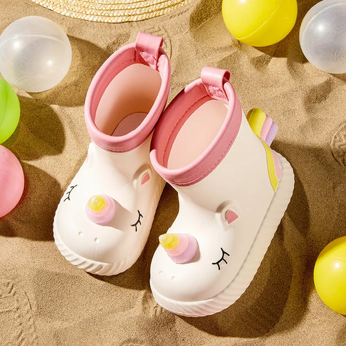 Pink unicorn rain boots for kids – waterproof outdoor lifestyle view