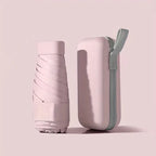 Powder pink mini pocket umbrella with protective capsule