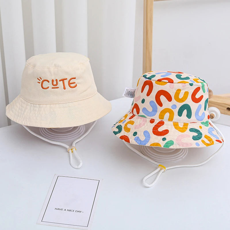 Reversible bucket hat for kids with cute and colorful print sides