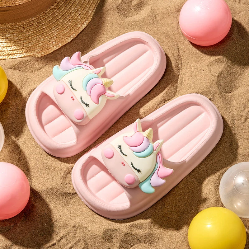 Pink and cream unicorn slippers for kids – lifestyle view