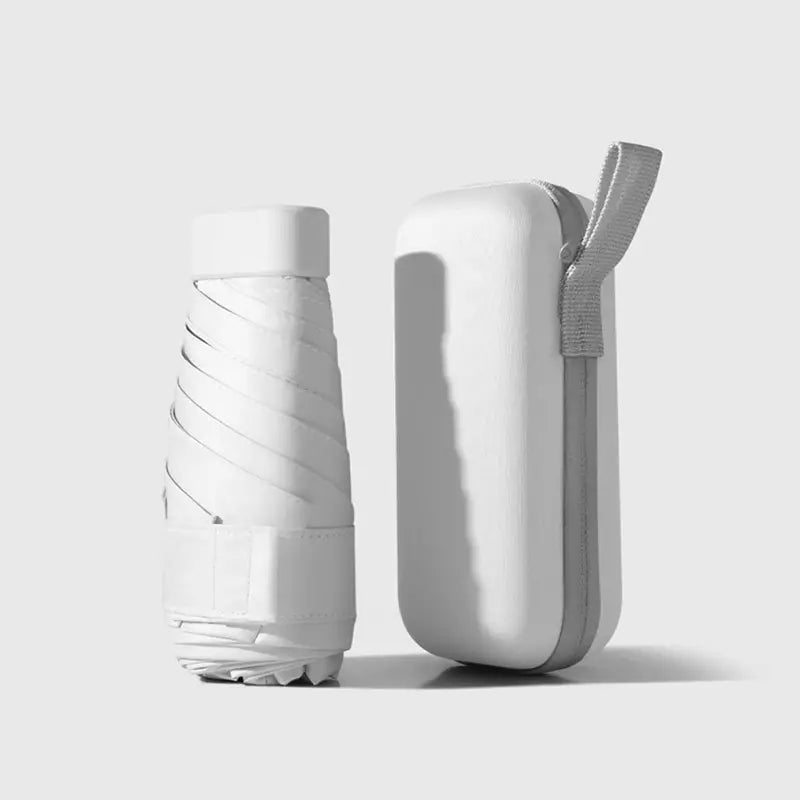 White mini pocket umbrella with protective capsule