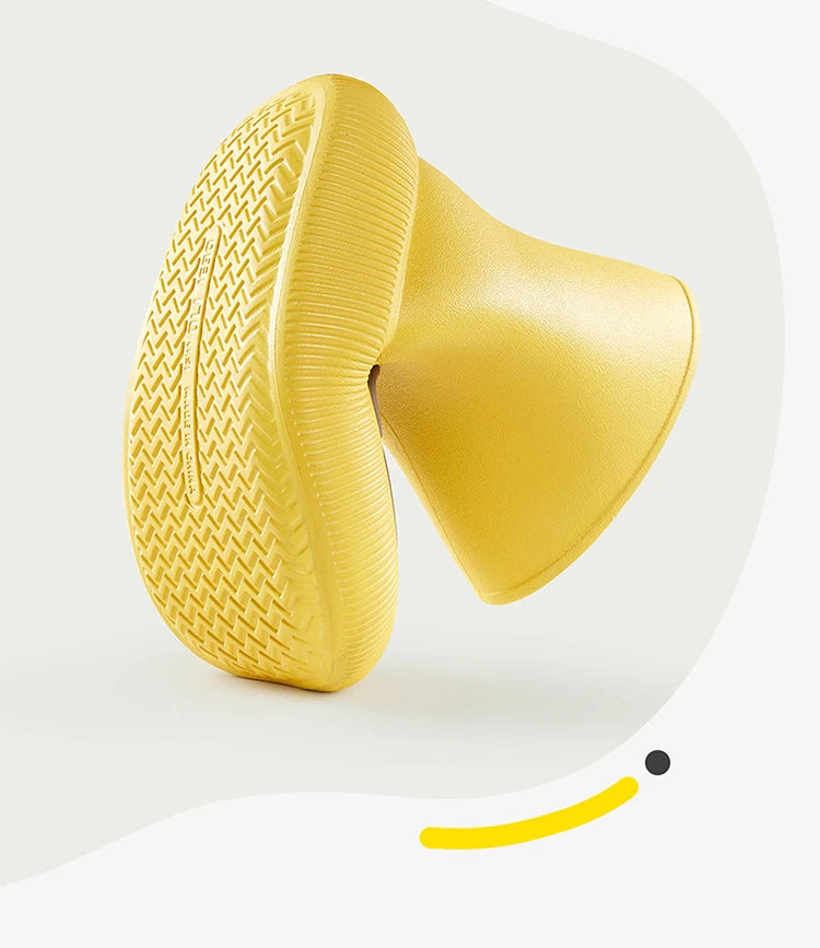 Yellow kids rain boots with textured non-slip sole